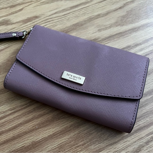 kate spade Handbags - kate spade mauve wristlet wallet with gold hardware